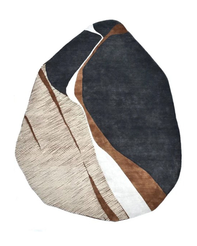 Terra Orbit hand-tufted wool rug with circular abstract orbit design in earthy tones, modern sculptural shape, and plush luxury texture for contemporary interiors.